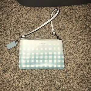 Brand new, without tags, small Coach wristlet